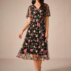 Chic Black Floral Midi Dress With Sheer Sleeve